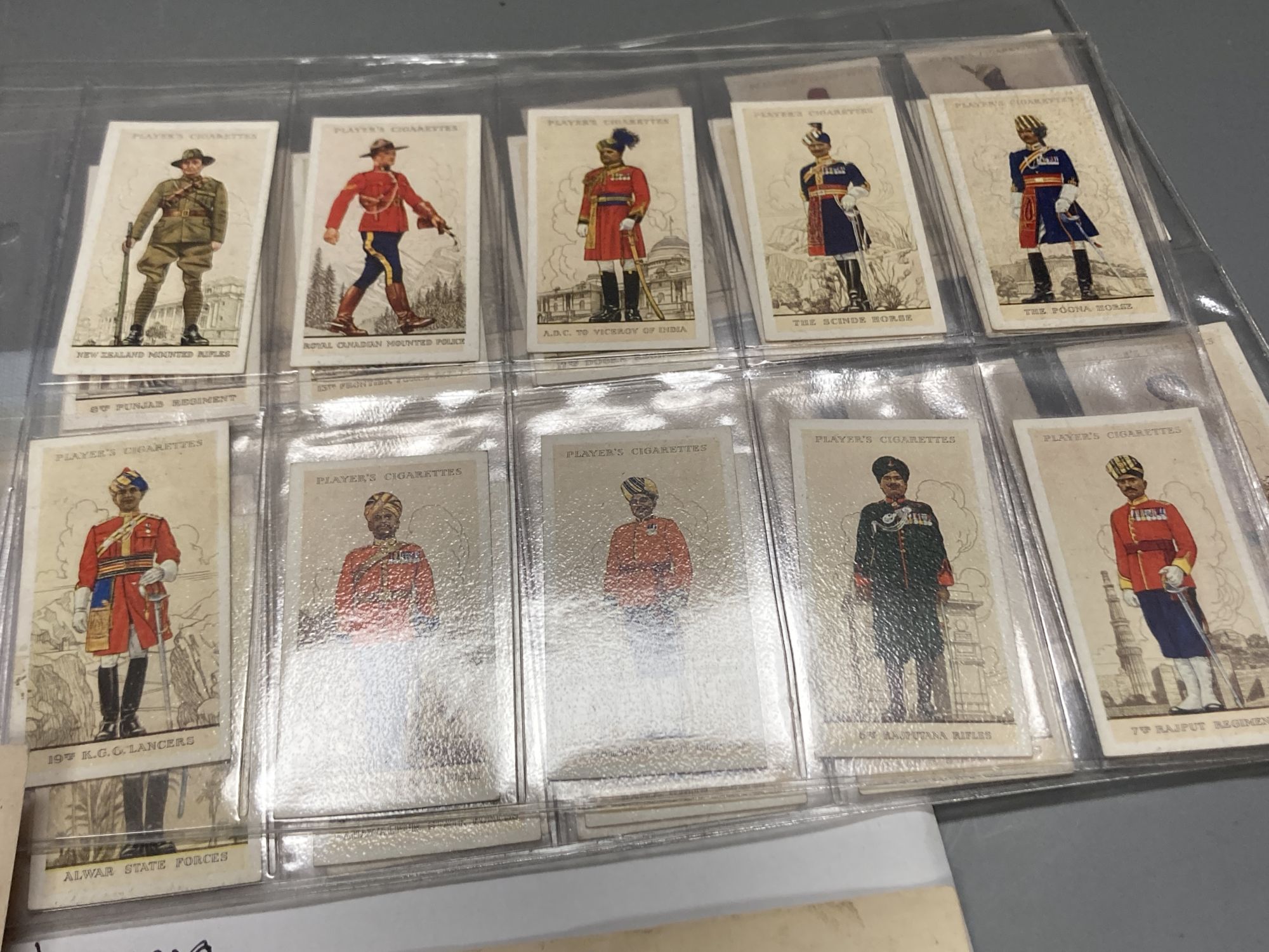 A quantity of ephemera including cigarette cards, Players Cigarettes 1938 numbered 1 - 46, Military Uniforms of the British Empire Ove